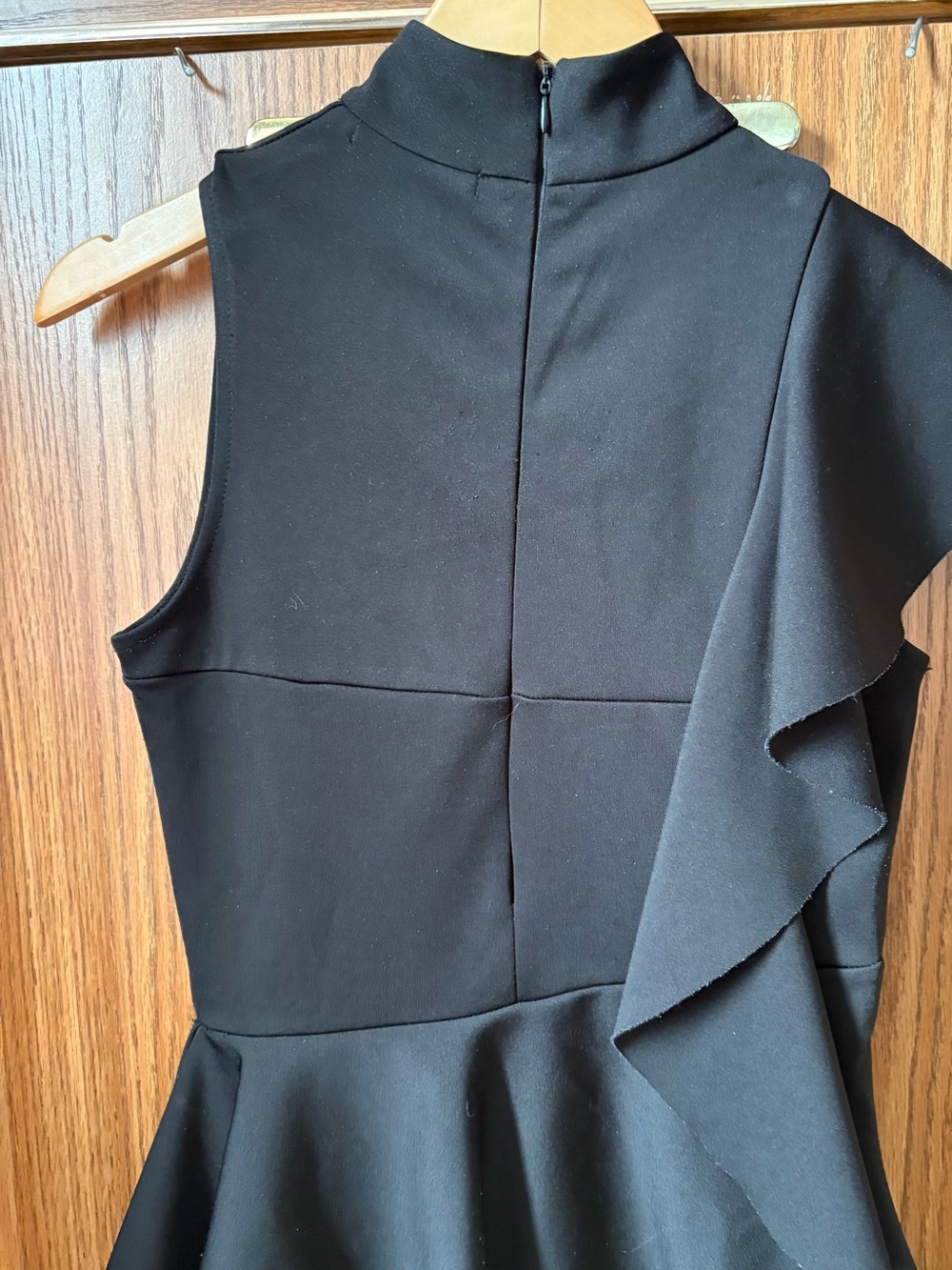 Asymmetrical Black Ruffle Peplum Top - Picture 2 of 9